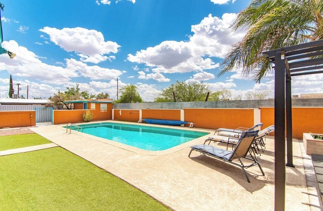 This centrally located 1 bedroom features a full size pool and electric vehicle charging on site.