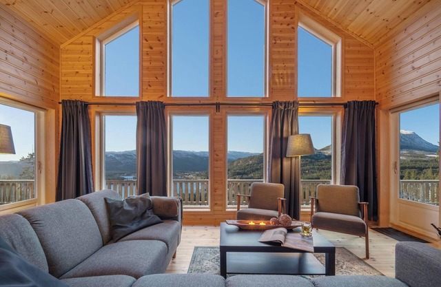 This charming Norwegian home with breathtaking views of fjords and Lake Nisser is suitable for 8 people.