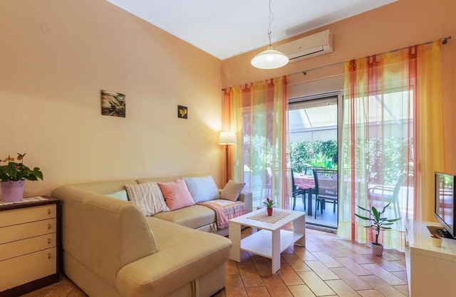 This charming vacation apartment is located on the first floor of a family house.
