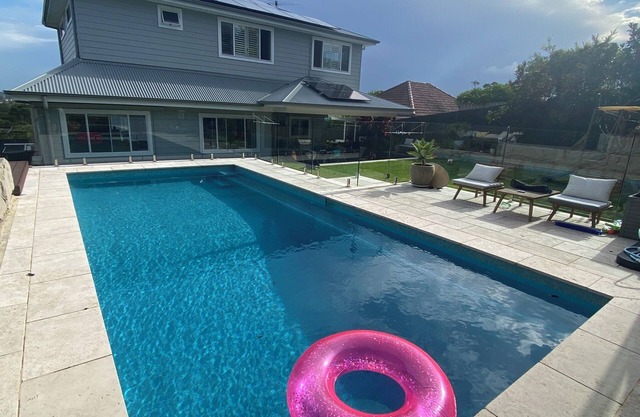 This house is a 4 bedroom(s), 3 bathrooms, located in Warriewood, NSW.