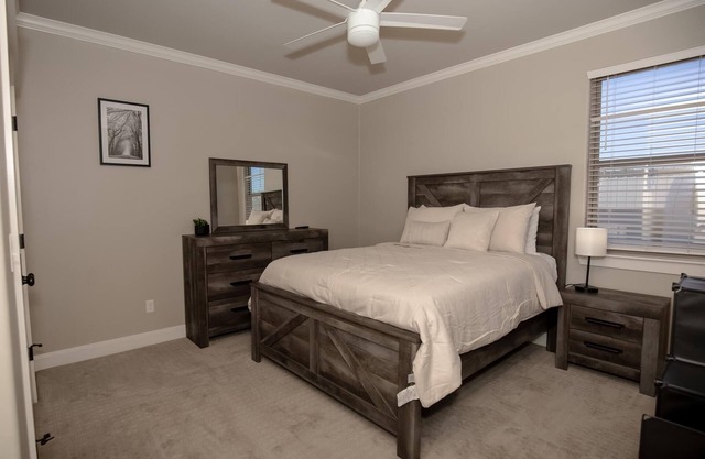 This spacious retreat features 5 bedrooms, 2 futons, and 2 reclinable couches