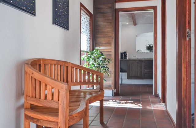 This vacation home is located directly in the forest, yet close to the town of Varde.
