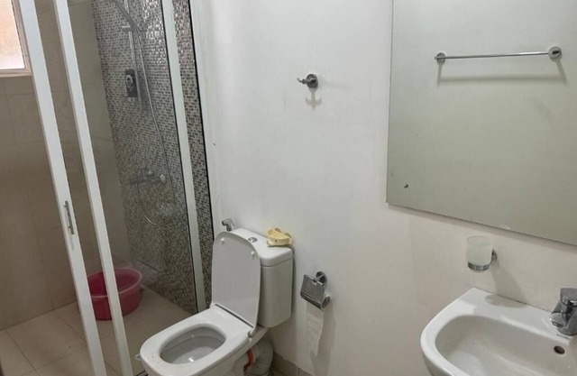 Three bedroom, three bathroom house with all the amenities, shared swimming Pool