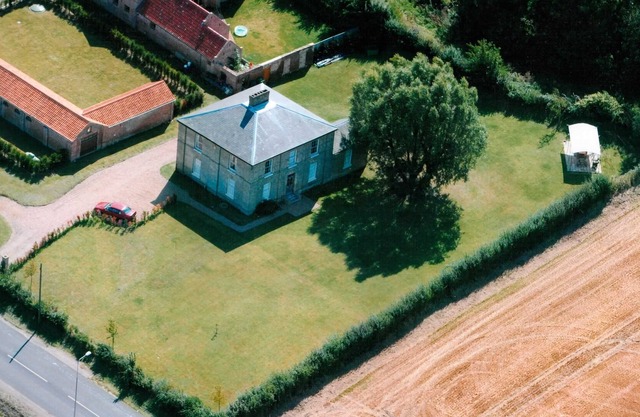 Tilney Hall. A listed Georgian Hall set in its own grounds.