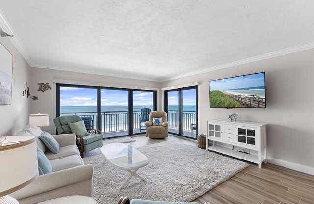 Top-floor direct oceanfront condo with a private balcony, heated pool and beach access