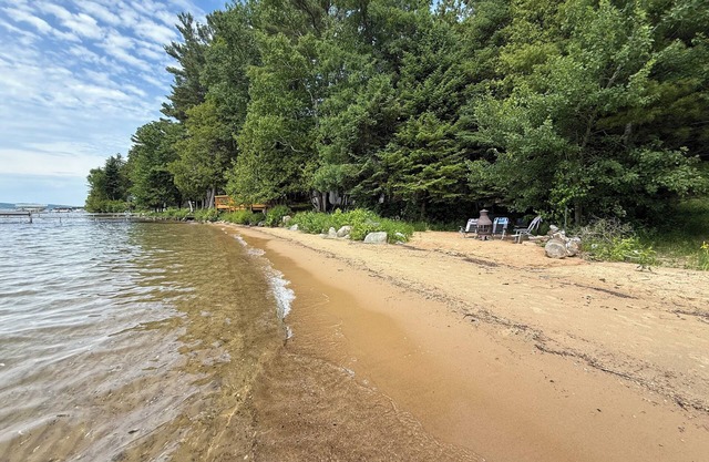 Torch Lake Exceptional Lakefront Cottage and Guest House - with Sandy Beach