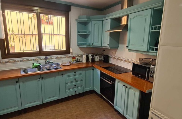 Town House with roof terrace and stunning views. Close to all local amenities