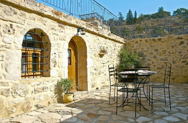 traditional holiday home in Vafes with a view of the countryside