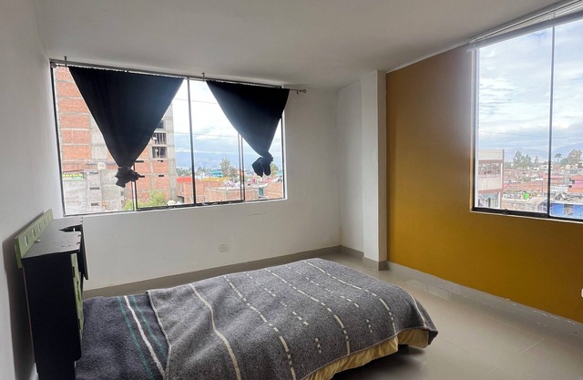 Travel's house in Cupaca has a shared living room and kitchen. For all V