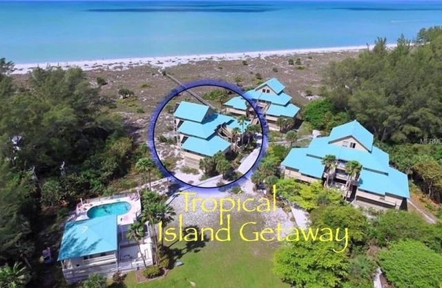 Tropical Island Getaway Beachfront Condo; Gulf Views, Pool, Ferry & Parking incl