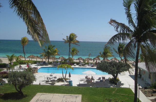Tropical paradise steps away from gorgeous sandy beach & beautiful blue water