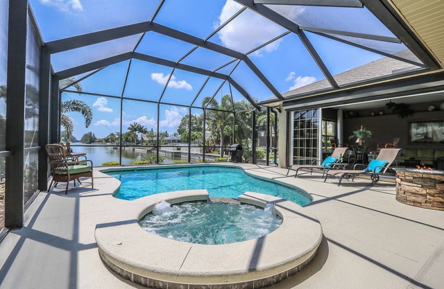 Tropical Waterfront Paradise with Amazing Sunset Views!