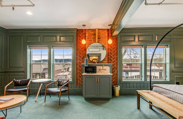 Two lavish rooms at Hotel Scandi with living area & walkable locale
