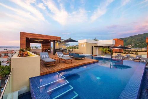 Two Pools and Gym | Steps from Beach and Malecon