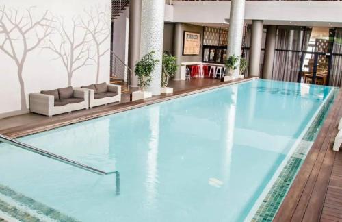 uMhlanga Home with FREE WiFi, Pool, Gym at Urban Park