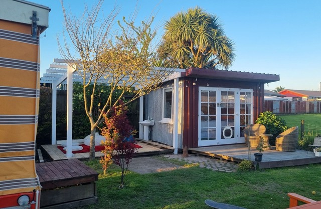 Unique, delightful Tiny Home with Alfresco living area including retro Poptop.