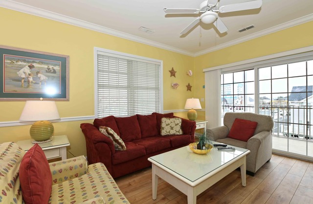 Unique, festive 3-bedroom luxury condo with adorable coastal decor and free WiFi located downtown on the bayside and just two blocks to the beach and Boardwalk!