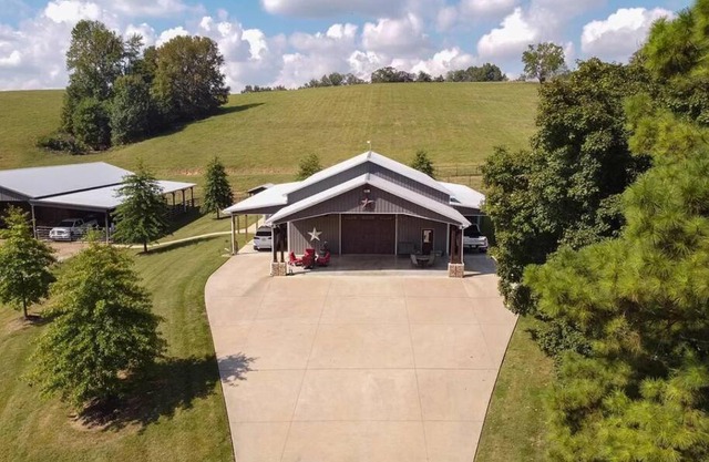 Unique home on a beautiful ranch w/ stocked pond