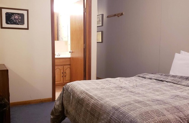 Unique, Private guestroom inside the Lodge at North Ironwood Acres resort with TWO QUEEN beds and two small bathrooms. DOG FRIENDLY!