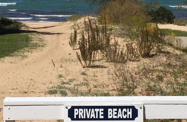 Unique property with main cottage, guest house and private beach access.