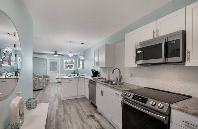 Unit B.CLEAN,Great Location,Dockage Available,HEATED Pool,HUGE Back yard