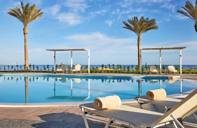 Unwind in Style with Pools, Spa, Yoga, Waterpark Access & Dining Options