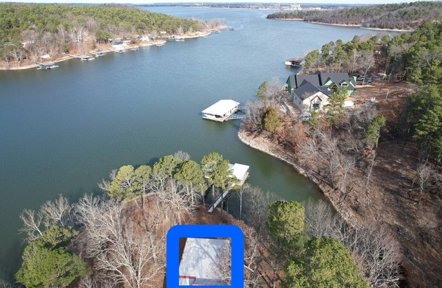 Updated 3 bedroom lakefront home offers privacy and comfort w dock on Grand Lake