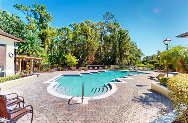 Updated apartment with community pool & gym - balcony, W/D, and great location