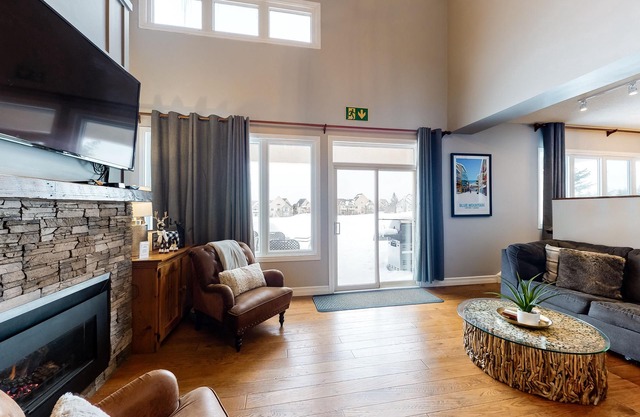 Updated condo with gas fireplace, private sauna, WiFi, central A/C, & W/D
