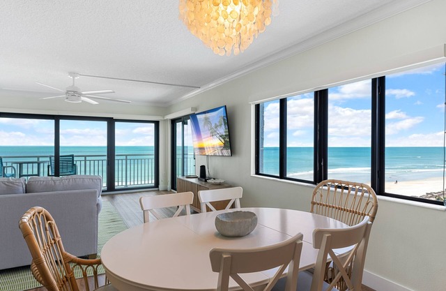Updated direct oceanfront corner condo with large wrap-around balcony and heated pool