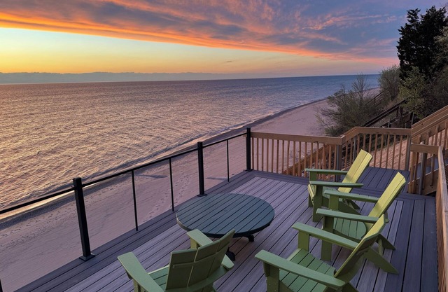 Updated lakefront oasis with private beach, fire pit, amazing views & waterside balcony!