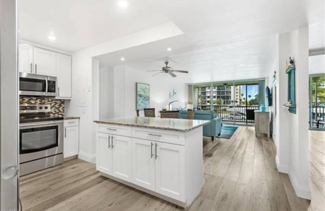 Upscale condo steps from gorgeous Vanderbilt beach