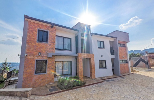 Urban 2BR Retreat Wi-Fi & Local Kigali Vibe