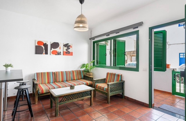 Vacation Apartment 'Famarabeach' with Mountain View, Private Terrace and Wi-Fi