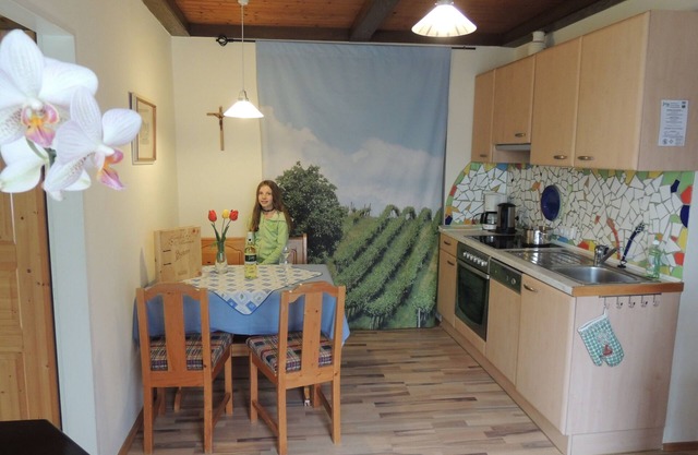 Vacation apartment (40sqm) with spacious bathroom and seating area in the garden