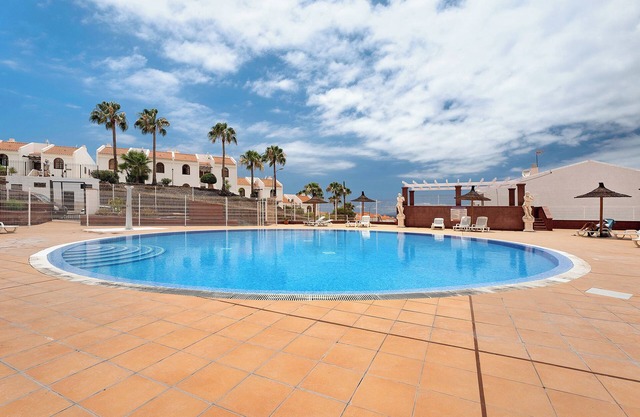 Vacation Apartment 'Torviscas Endless Summer' with Sea View, Shared Pool and Wi-Fi