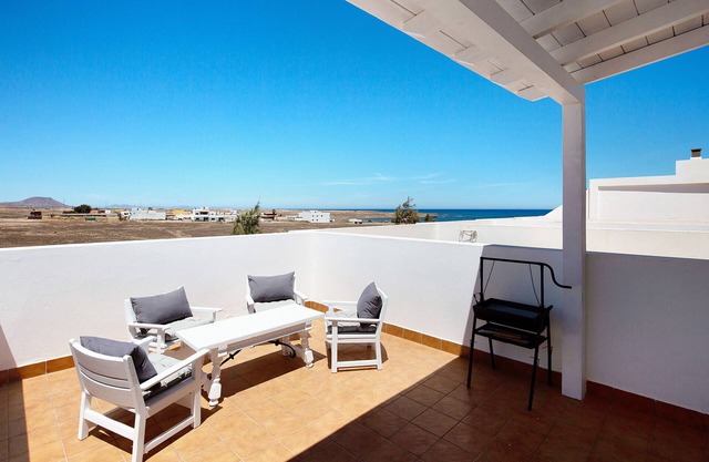 Vacation Home "Tranquilidad En La Playa" with Mountain View, Private Terrace & Wi-Fi