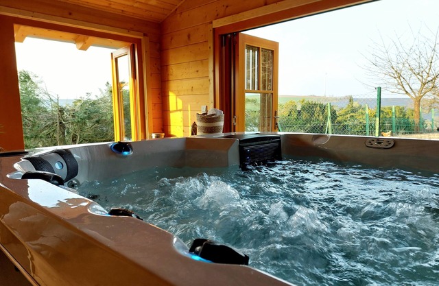 Vacation home with garden, playground, whirlpool, wood-fired sauna, pet-friendly