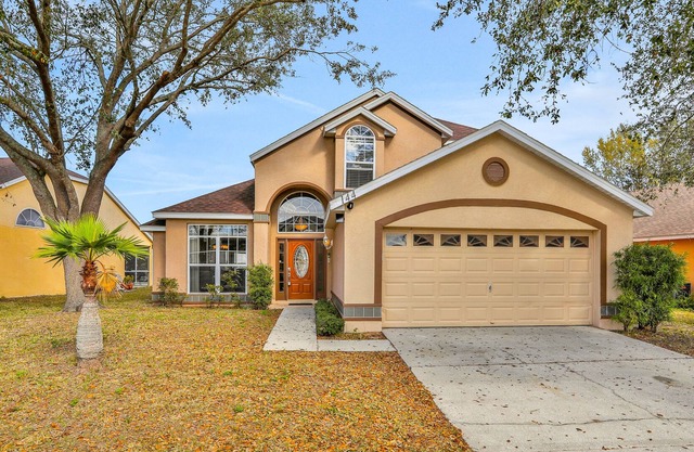 Vibrant home with gas grill, pool, patio, & game room - snowbird-friendly