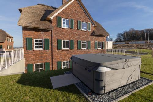 Villa BalticBliss auf Rügen - direkt am Golplatz mit Sauna und Jacuzzi