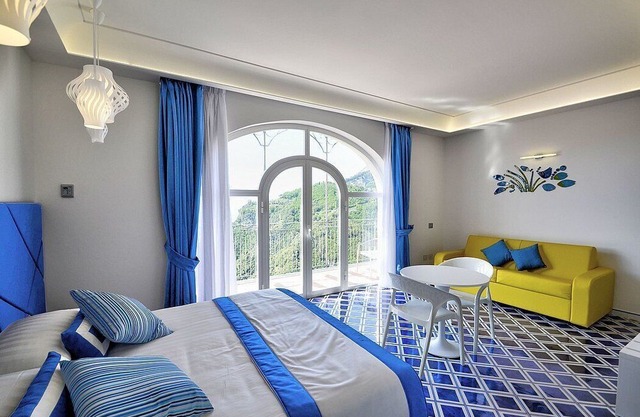 Villa Clarice A, fully refundable with voucher*: A bright and sunny apartment in a quiet position, located on a hillside above the sea, with Free WI-FI.
