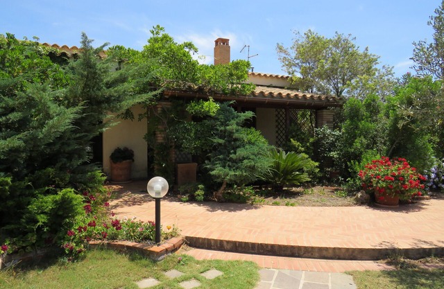 Villa near the sea submerged in greenery