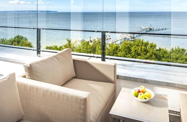 Villa Philine - Penthouse 28 mit Panoramablick, Pool, SPA & Kamin