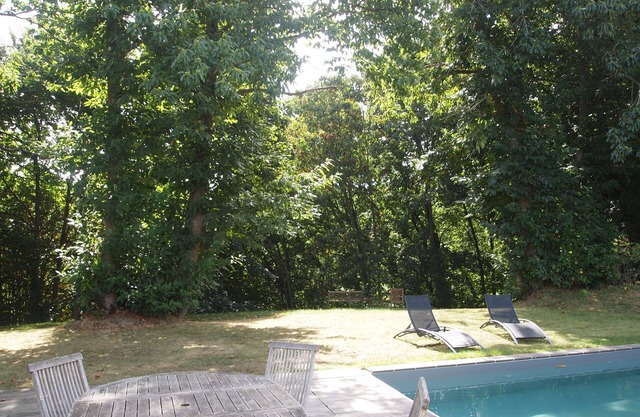 Villa with heated pool and balneotherapy facing the forest
