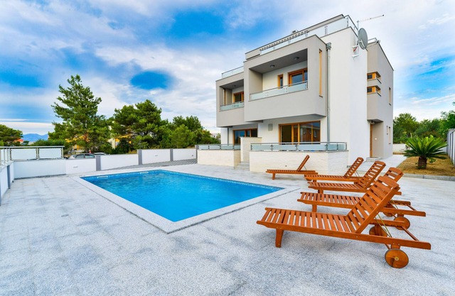 Villa with pool, 50 m from the sandy beach, beautiful sea view