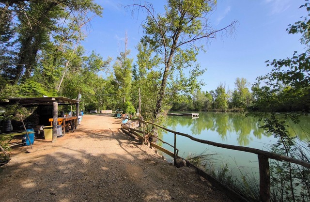 Villa with private pond and large plot close to the sea