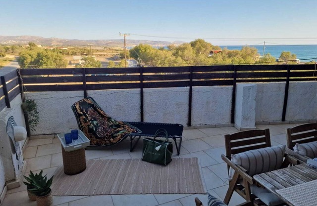 Vintage chic seaside maisonette is located on just a few meters from the beach.