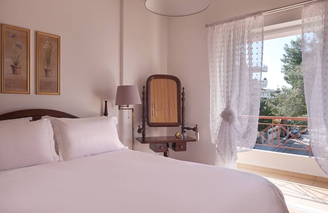 Voula Riviera Stylish Maisonette with Lush Garden, Near-Beach!