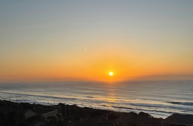 Wake up to gorgeous sunrises and sea views upon a wooden balcony.
