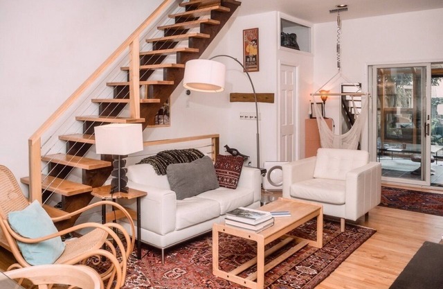 Walk everywhere in A+ location: garden, parking, playroom, sauna, decks, sunroom